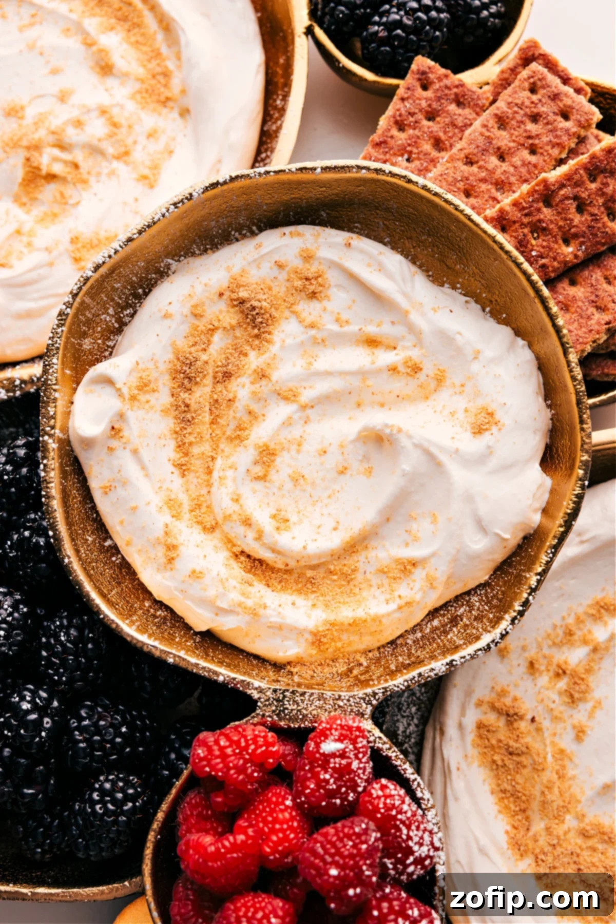 Delicious Cheesecake Dip Cheesecake Dip with graham crackers and berries