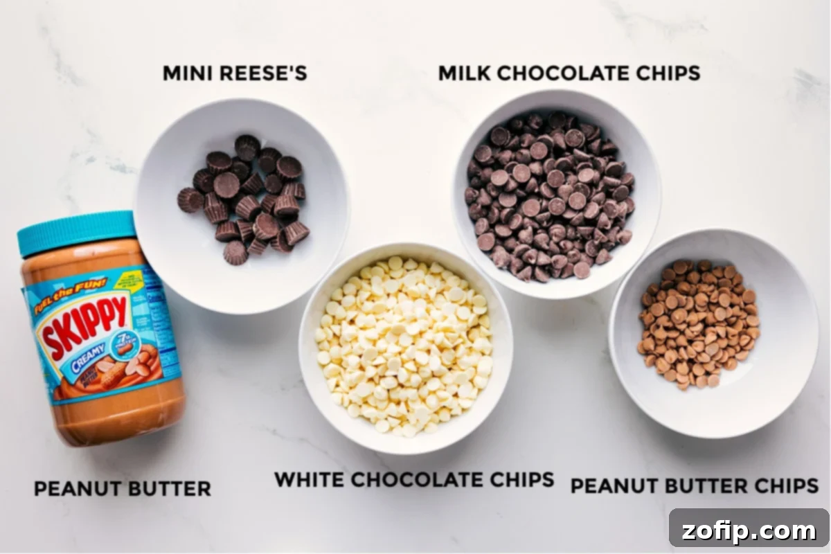 Ingredients In Peanut Butter Bark Ingredients prepped in small bowls for easy assembly.