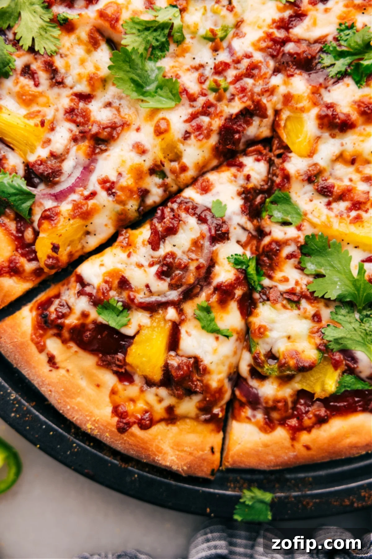 Easy And Delicious BBQ Chicken Pizza Recipe The BBQ Chicken Pizza fresh out of the oven, topped with cilantro.