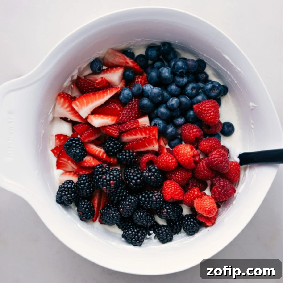 Fold Berries Into The Cheesecake Cream