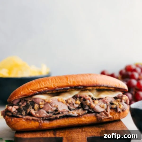 Ultimate Philly Cheesesteak Experience 2 Easy and melty French Dip Sandwiches ready to be enjoyed.