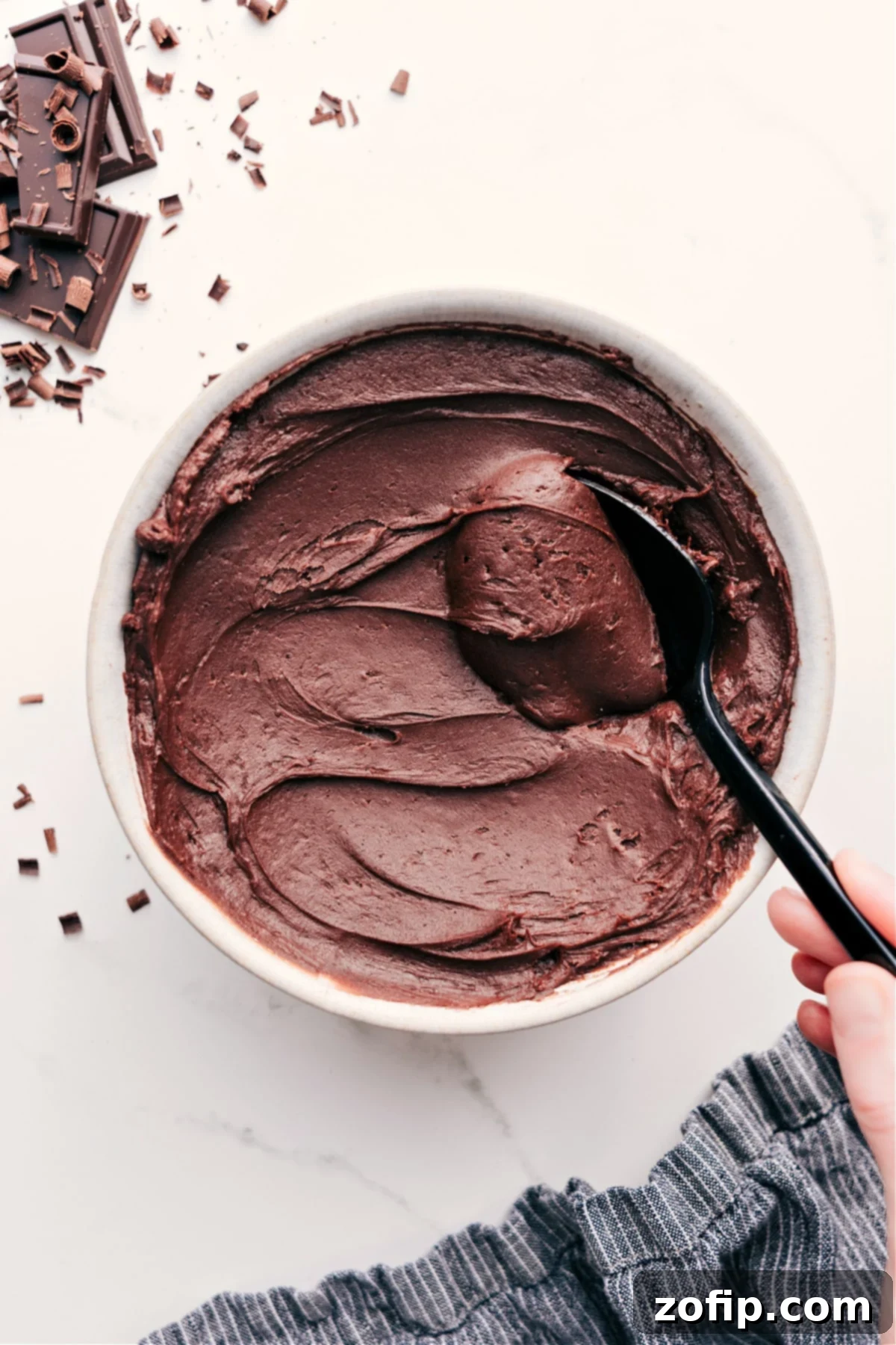 Chocolate Buttercream Frosting Recipe In A Bowl Chocolate Buttercream Frosting Recipe in a bowl, ready to be devoured.